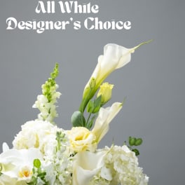 White floral arrangement with calla lilies and hydrangeas