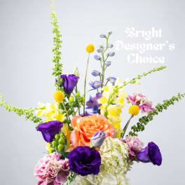 Colorful mixed bouquet with roses, lisianthus, and yellow snapdragons