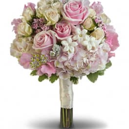 Pink and white rose bouquet with hydrangea and small white flowers