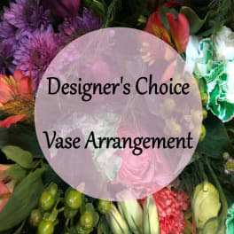Designer’s choice vase arrangement with mixed pink, purple, red, and white flowers