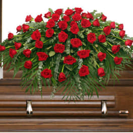 MAJESTIC RED CASKET SPRAY OF FUNERAL FLOWERS