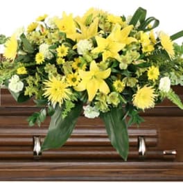 MOURNING SUNSHINE CASKET SPRAY