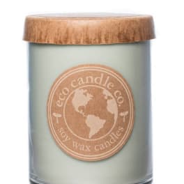 Soy wax candle in a glass jar with a wooden lid