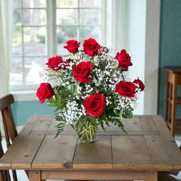 One Dozen Long Stem Red Roses in a vase
