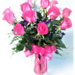 Bouquet of pink roses with a pink ribbon