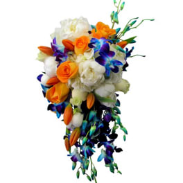 Cascade bouquet of orange, white, and blue-purple flowers