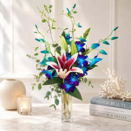 Blue Orchids and Stargazer Lily Vase
