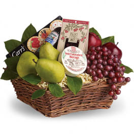 Fruit and cheese gift basket in a wicker tray