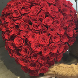Large heart-shaped bouquet of red roses