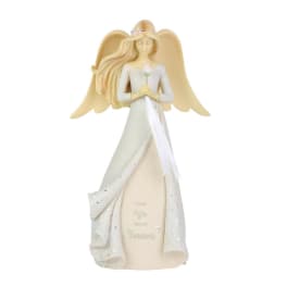 Angel figurine holding a small flower
