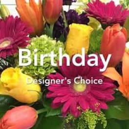 Colorful mixed bouquet with tulips and gerbera daisies