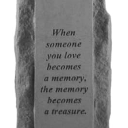 Gray memorial plaque with an engraved quote