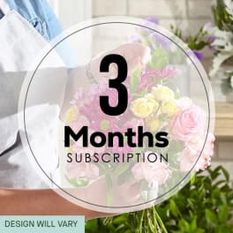 Person holding a pink and yellow mixed flower bouquet with a 3 months subscription label