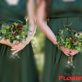 Two bridesmaids hold small green bouquets with pinecones and berries.