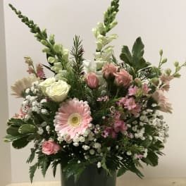 Pink and white mixed bouquet in a glass vase