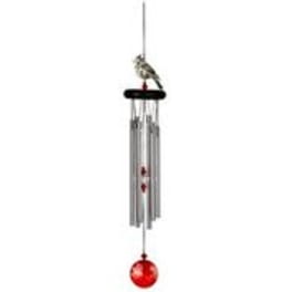 Silver wind chime with a red glass bead hanging below