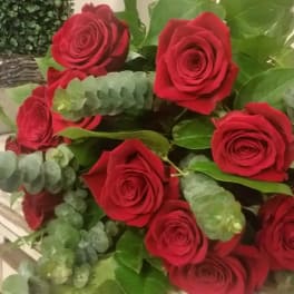 Bouquet of red roses with eucalyptus greenery