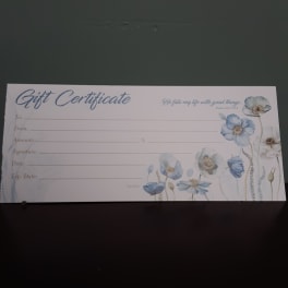Floral gift certificate with blue and white flowers