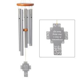 Silver wind chime with a cross-shaped remembrance tag