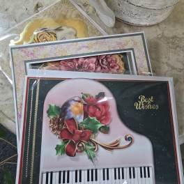 Decorative greeting cards with floral and bird designs