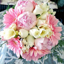 Pink and white bouquet with peonies, gerbera daisies, and calla lilies