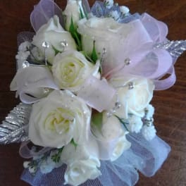 White rose bouquet with lavender ribbon and silver accents