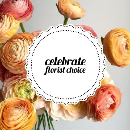 Assorted ranunculus flowers around a circular label reading florist choice