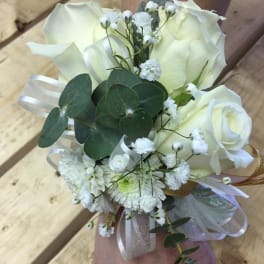 White rose wrist corsage with baby's breath and ribbon