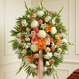 Deepest Sympathy Standing Spray-Peach/Orange/White (Deluxe Shown)