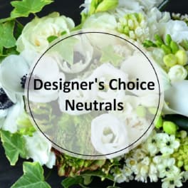 White and pale green floral arrangement with mixed blooms