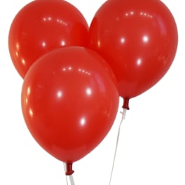 Three red balloons on white strings against a white background