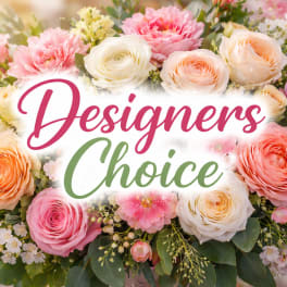 Mixed pink and peach roses with white flowers around "Designers Choice" text