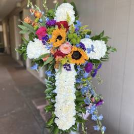 White Cross with Colorful Cluster