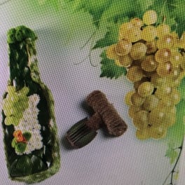 Two floral garlands with yellow and white blossoms and a small brown comb-like accessory