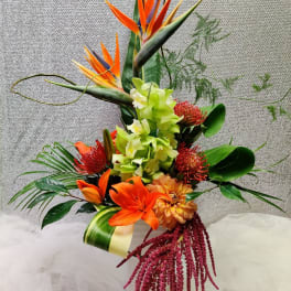 Tall tropical bouquet with orange bird of paradise and orchids