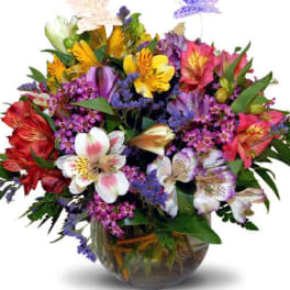 Colorful bouquet of mixed flowers in a glass vase