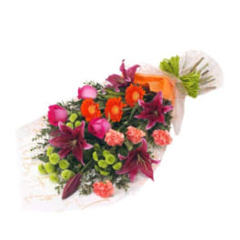 Bouquet of pink roses, orange daisies, and purple lilies wrapped in clear paper