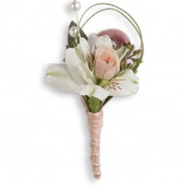 Small white and blush floral boutonniere with pearl accents