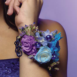 Purple and blue floral wrist corsage with beads
