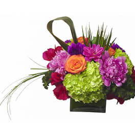 Colorful flower basket with roses and hydrangeas