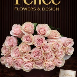Large bouquet of pale pink roses in a round box