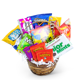 Basket filled with assorted candy and snack packages