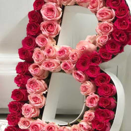 Large floral number 8 covered in pink and red roses