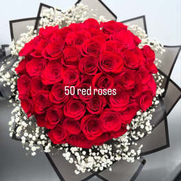 Bouquet of red roses with white baby's breath