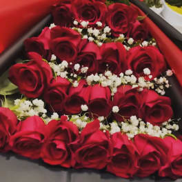 Bouquet of red roses with white baby's breath