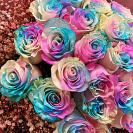 Bouquet of multicolored roses with pink baby's breath