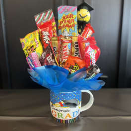 Candy bouquet in a graduation mug with blue wrap