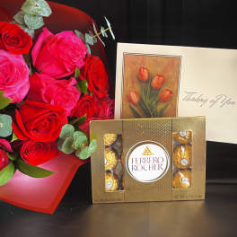 Red and pink roses with a Ferrero Rocher box and a thinking of you card