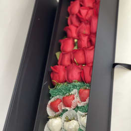 Box of red roses with chocolate-covered strawberries