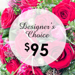 Bouquet of red roses with greenery and a price label